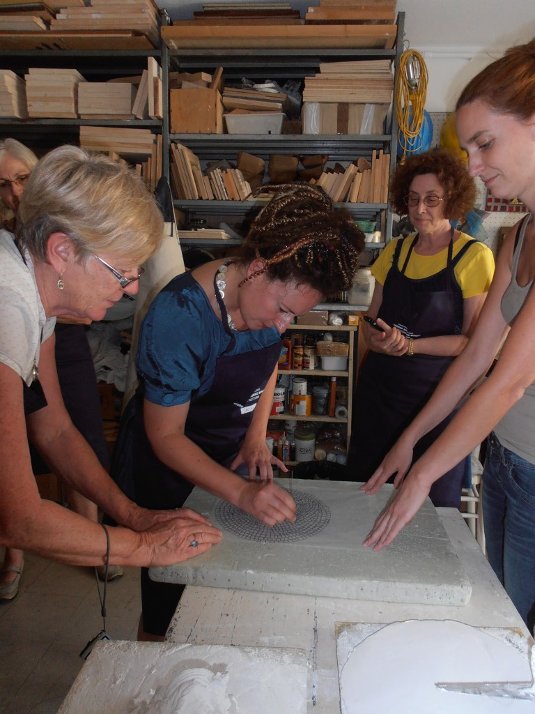 Sarah-Alice Miles at work in Ravenna- making mosaics the ancient way.