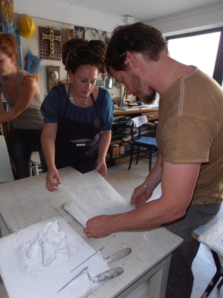 Sarah-Alice Miles at work in Ravenna- making mosaics the ancient way.