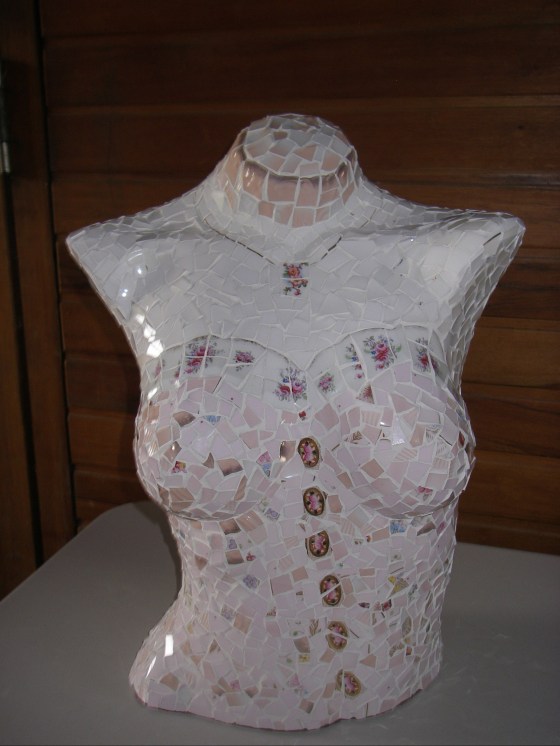 A mosaic art bust of a female form